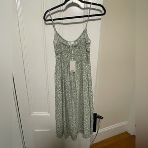 Cute dress never worn! Bought for $228 - selling for $100 or best offer